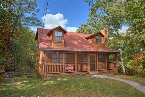 With the ability to sleep up to 14 guests at a time, our 3 bedroom cabins in pigeon forge tn and gatlinburg tn are perfect for large families and small groups to relax with one another in the heart of the smoky mountains. Wolves Den | 3 Bedroom Cabin | Cabins USA Gatlinburg