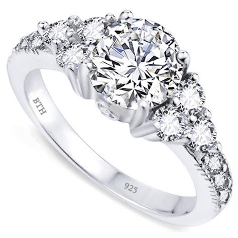 Matching wedding band is set with 3 genuine diamond accents. Ladies 925 Sterling Silver Engagement Band Ring
