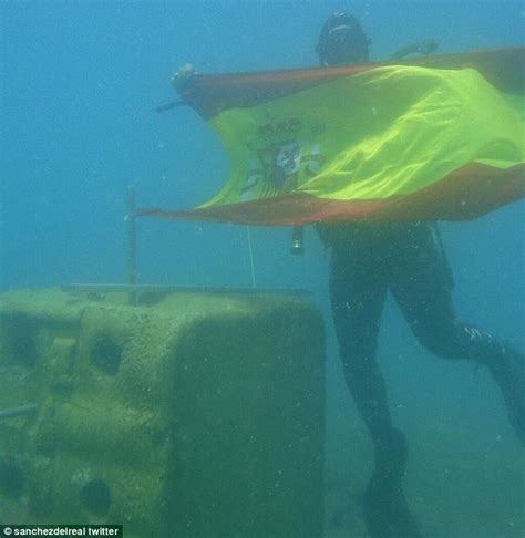 Spanish Police Unfurl Flag In Gibraltan Waters As They Inspect