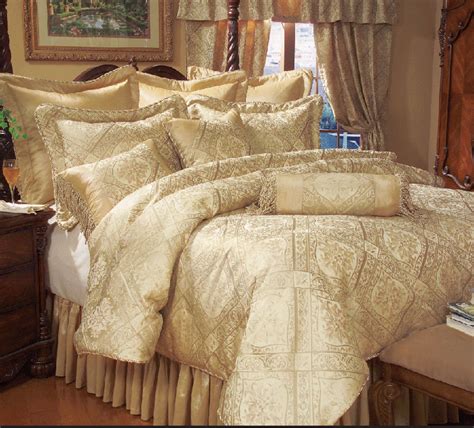 Deep purple hues perfectly contrast with cream and subtle details for a bedding set that's chic and streamline. 9 Piece Gold Imperial Comforter Set