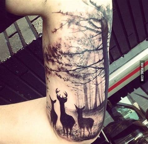 A Man With A Deer Tattoo On His Arm