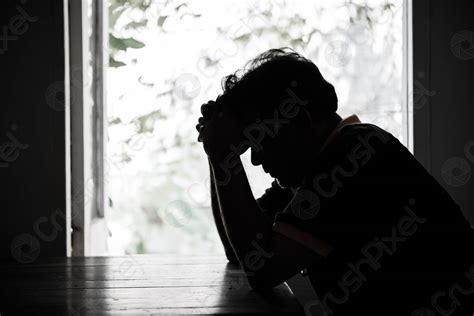 Sad Man Sitting Head In Hands Sitting In The Dark Stock Photo 1128510