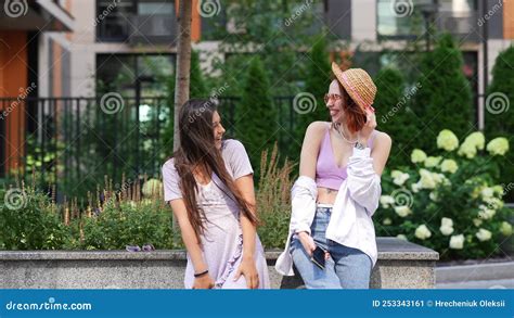 Two Beautiful Women Talking And Standing Outdoors Stock Video Video