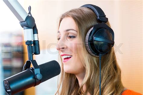 Female Radio Presenter In Radio Station On Air Stock Image Colourbox