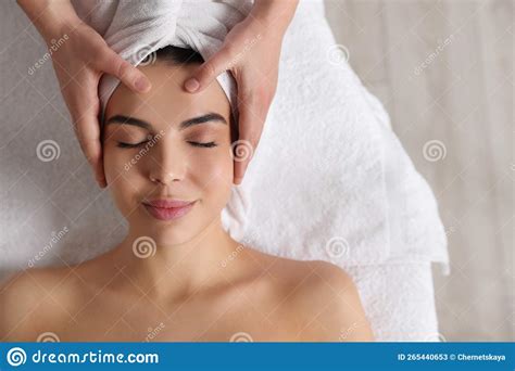 Beautiful Woman Receiving Facial Massage In Beauty Salon Closeup Top View Stock Image Image