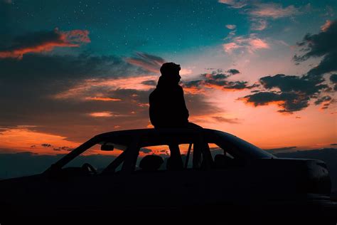 Hd Wallpaper Silhouette Of Man Sitting On Car Roof Person Cloud