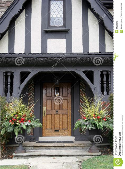 See more ideas about tudor style, interior, home. Front Door With Christmas Decorations Stock Photo - Image ...