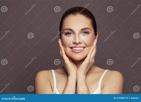 Happy Young Woman Spa Model With Clear Skin Smiling On Brown Background