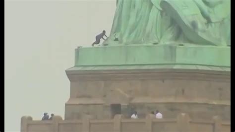 Statue Of Liberty Evacuated After Woman Scales Monument Youtube