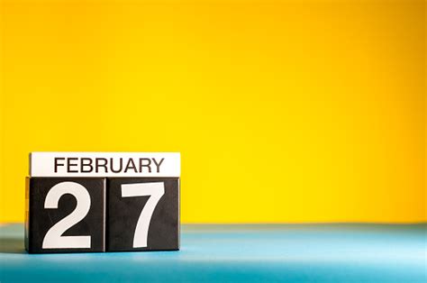 February 27th Day 27 Of February Month Calendar On Yellow Background