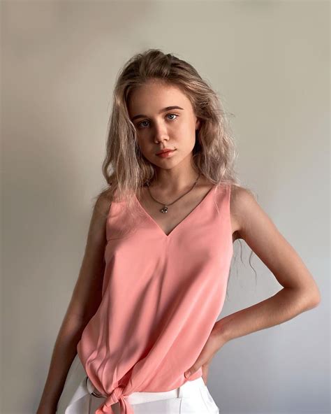 Alisa Goldfinch Photoshoot In Peach Color Top And White Bottom January