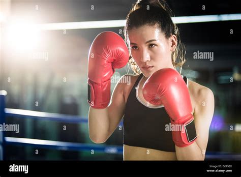 Female Chinese Boxer Practicing In Boxing Ring Stock Photo Alamy