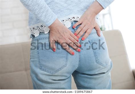 Woman With Haemorrhoids Touching Her Bud With Her Hands