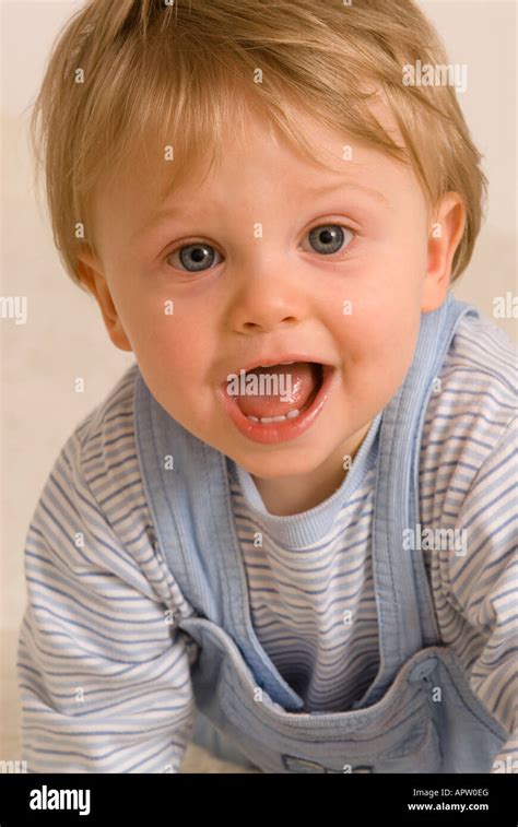 One Year Old Baby Boy Smiling Laughing Showing Teeth Stock Photo Alamy