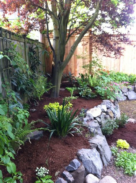 Mulched Raised Flower Bed With Rock Wall Landscapefrontyardwithrock