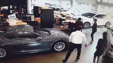 Angry Businessman Crashes £100k Porsche Into Dealership Ladbible