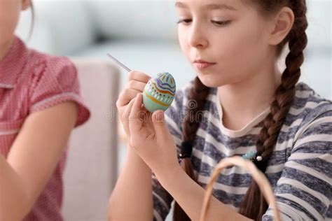 Cute Little Girl Painting Eggs For Easter At Home Stock Image Image