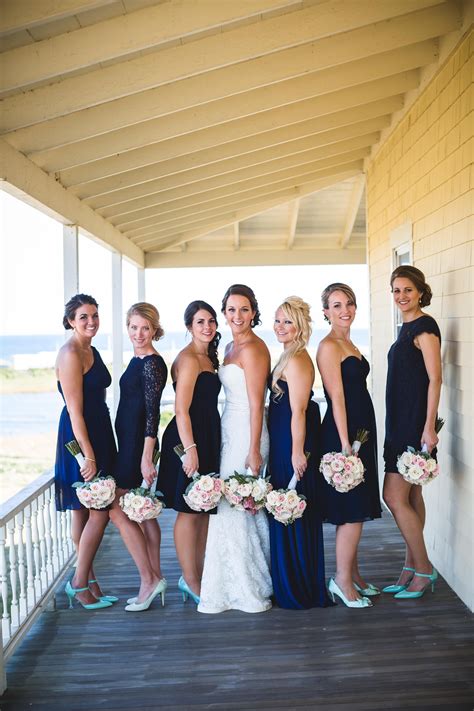 Bride And Bridesmaids In Navy Dresses And Mint Heels