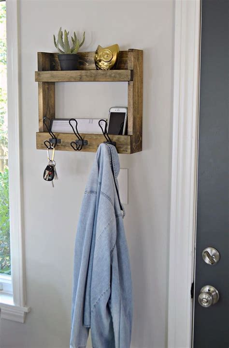 This rustic industrial coat rack from diy showoff is a super easy entryway storage solution. Fabulous Farmhouse Joanna Gaines Inspired DIY Ideas - The ...