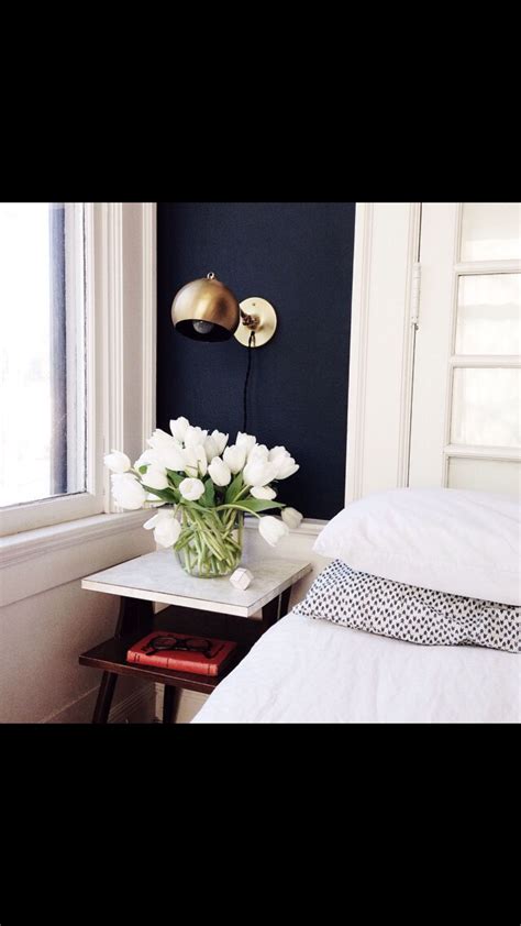 Accent walls are the most common décor feature in bedrooms, and the most popular way to add an accent feature is a headboard wall. Navy accent wall | Home bedroom, Home, Home decor