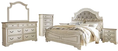 When it comes to furnishing bedrooms, many people wonder about one specific thing: Realyn 4pc Upholstered Panel Bedroom Set in Chipped White
