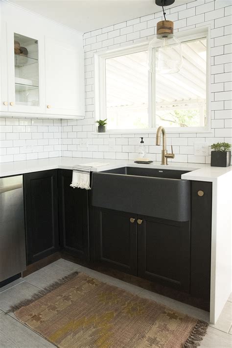 Right before we started installing flooring i finished the last of the cabinet painting by painting the island. Tuxedo Kitchen : Get the Look - Room for Tuesday Blog