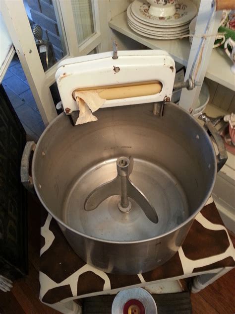 The antique washing machines were big and heavy, with a copper exterior and a dark patina. Maryland House Antiques: Vintage Table Top Washing Machine