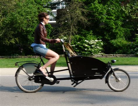 Comes with a large front pocket, hip belt pockets, and a water reservoir sleeve. Travelmag - Going Dutch: pedalling Amsterdam's ubiquitous ...