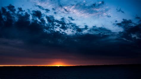 Looking for the best wallpapers? Download wallpaper 2048x1152 sunset, horizon, clouds, sky ...