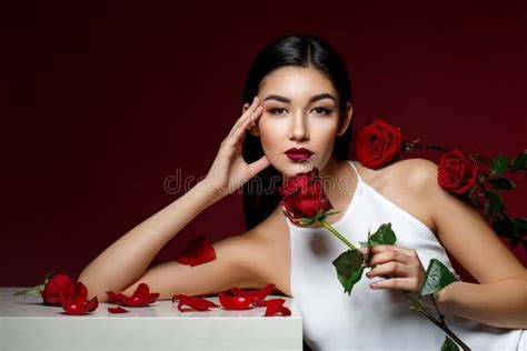 Beautiful Asian Brunette Girl With Red Roses Stock Image Image Of