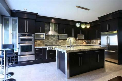 This custom kitchen is a contemporary take on a traditional style. Awesome 13 Black Shiny Kitchen Cabinets Ideas For Stunning ...