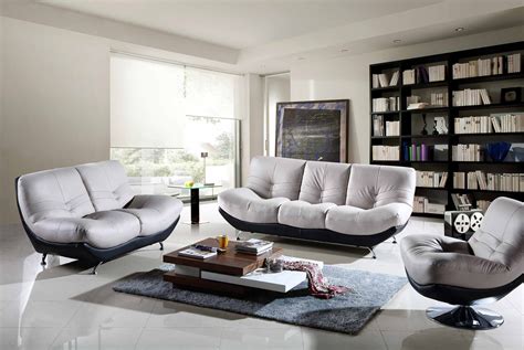 Contemporary Living Room With Sofas And A Charming White Minimalist Table Uniq Is The Fur Rug