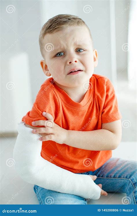 Little Boy With A Broken Arm Stock Photo Image Of Female