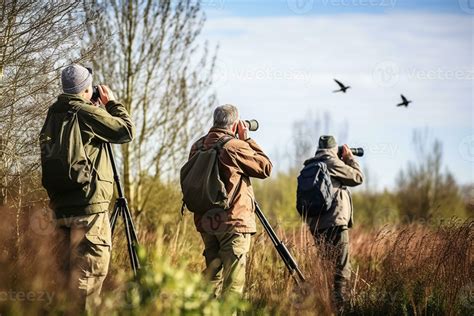 A nature reserve with birdwatchers observing rare migratory species of