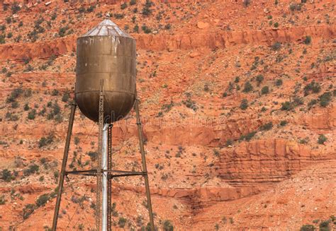 Copper Color Rustic Water Tower Utility Red Rock Mountain Background