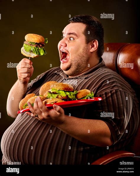 Fat Man Eating Fast Food Hamberger Breakfast For Overweight Person