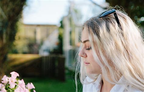 Young Woman Wearing Sunglasses On Her Head Porkkgas