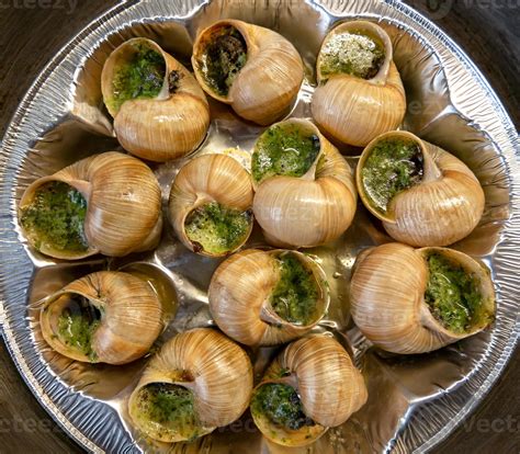 Escargots De Bourgogne Snails Stuffed With Herbs And Oil An Exquisite