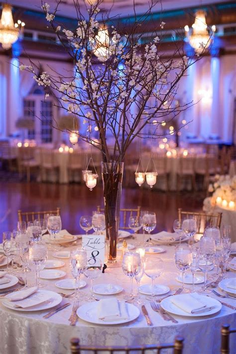 Whimsical Branch Centerpiece With Hanging Candles Centerpieces In