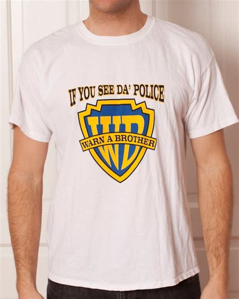 If You See Da Police Warn A Brother Warner Brothers Tshirt