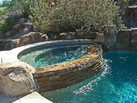 Jacuzzi sections, waterwalls & waterfalls, ponds & plants, planters & overflows. A Look At Some Infinity Edge Spas | Homes of the Rich