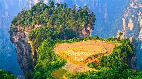 But your experience may be ruined by the whole of zhangjiajie national forest park is huge with many different scenic areas. Sunrise over hanging paddy field, Zhangjiajie National ...