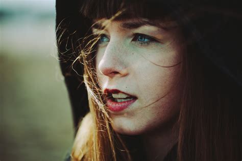Brunette Hair In Face Open Mouth Looking Away Face Red Lipstick Freckles Blue Eyes Hoods