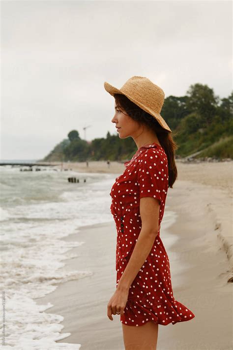 Woman In Hat Standing On Shore Del Colaborador De Stocksy Danil Nevsky Stocksy