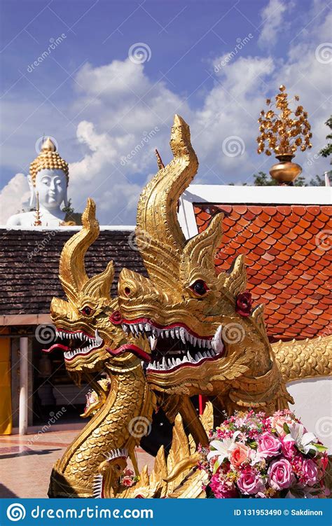 Beautiful Naga Statue And Buddha Statue Backgroundat Wat Doi Kham In