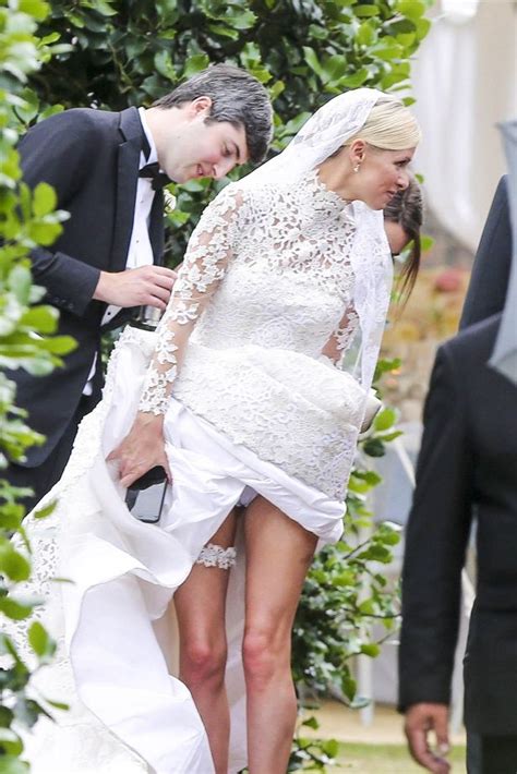 Watch As Blushing Bride Nicky Hilton Gets Veil Caught In Car Wheel Before Later Flashing Her