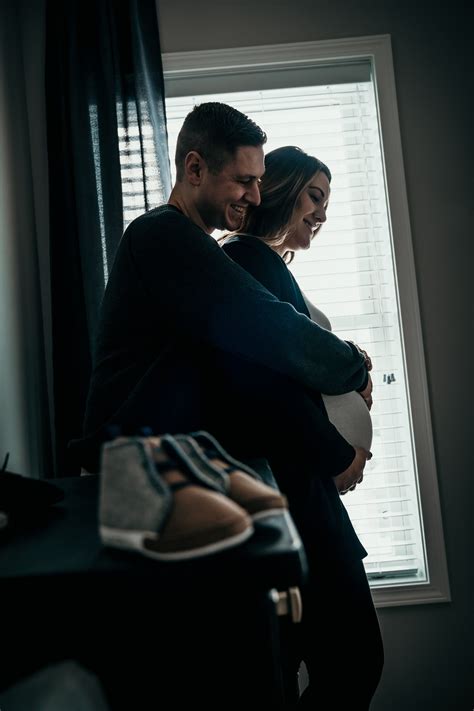 indoor maternity photoshoot couple
