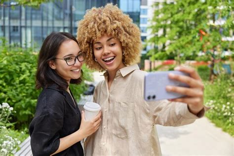 Premium Photo Multiracial Women Friends Spends Free Time Together In City Pose For Making