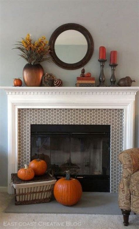 Incorporate fun outdoor items like this wood and fencing into your autumn mantel decor! 47 Cozy Fall Mantel Decor Ideas | ComfyDwelling.com