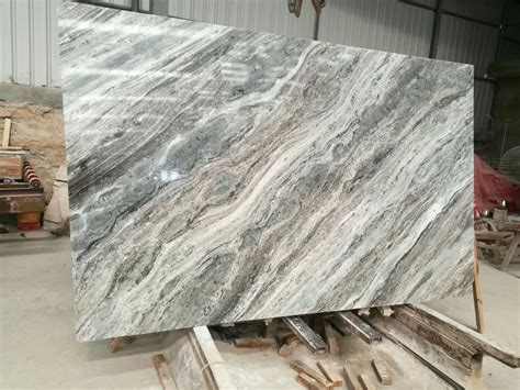 This countertop is 112 x 26 with a(n) straight or rectified edge, is made from marble and features a polished or high gloss finish. China Fantasy Brown Granite Slab for Kitchen/Bathroom/Wall/Floor - China Granite Tiles, Granite ...